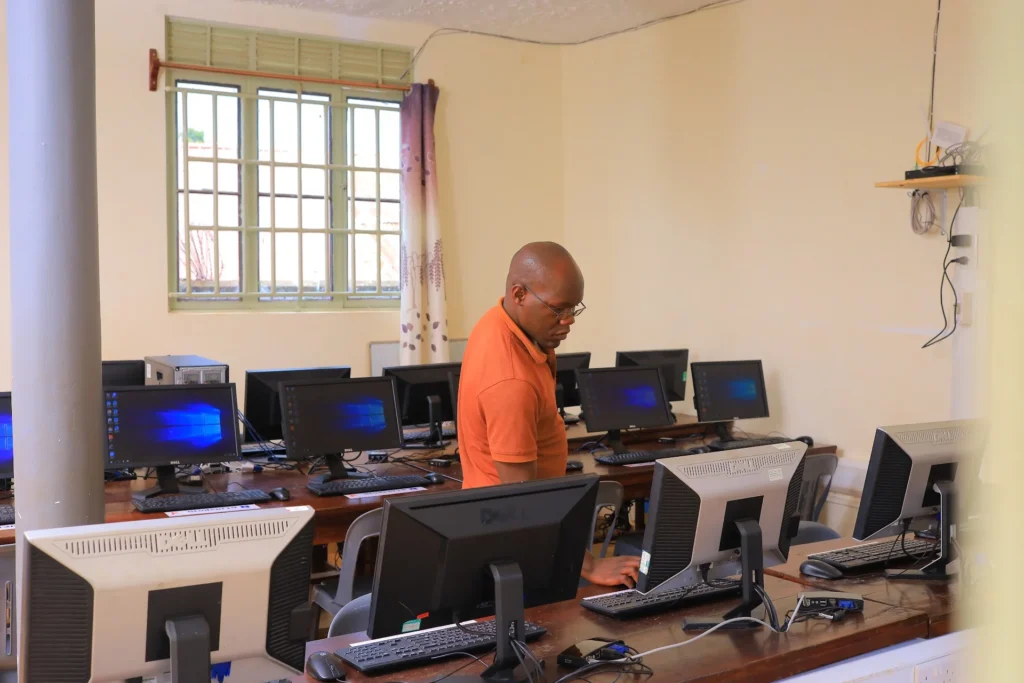 Computer Works Uganda technician setting up a school computer lab