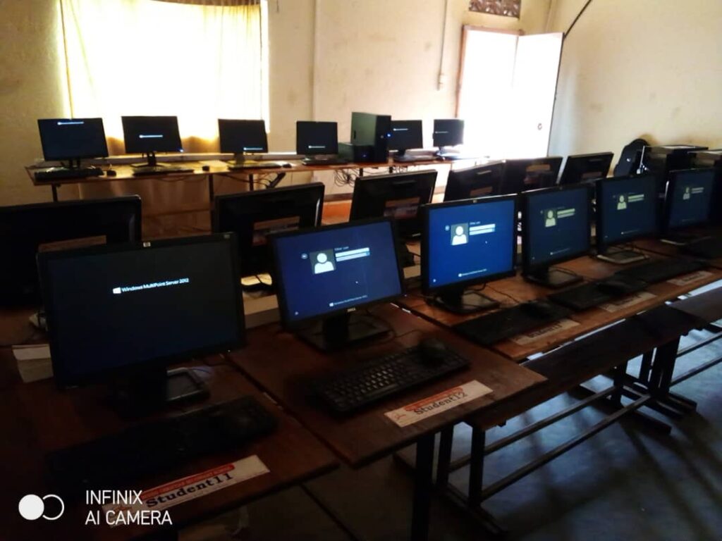 Rows of MultiPoint Server user stations in a Ugandan school computer lab